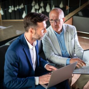 Business People Having Meeting In Modern Office In JHHWL8D 300x300